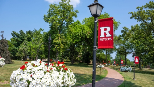 Bright banners line Sacred Path on the Douglass campus