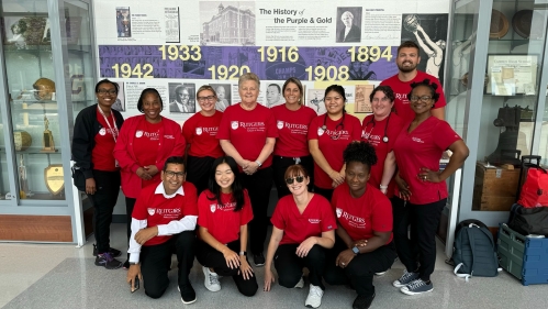 Group of students posing in class shirts