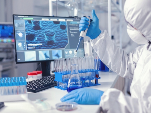 laboratory researcher performing experiment